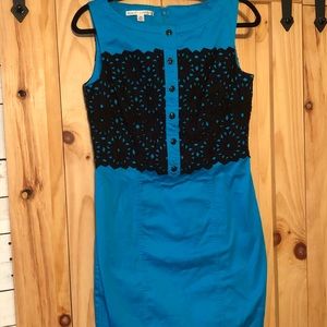 Form fitting bright blue dress